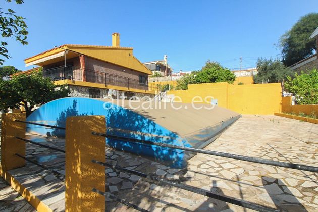 Foto 1 de Xalet en venda a Pueblo Poniente de 5 habitacions amb terrassa i piscina