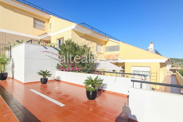 Foto 2 de Venta de casa adosada en Alfaz del Pi Pueblo-Urbanizaciones de 5 habitaciones con terraza y piscina