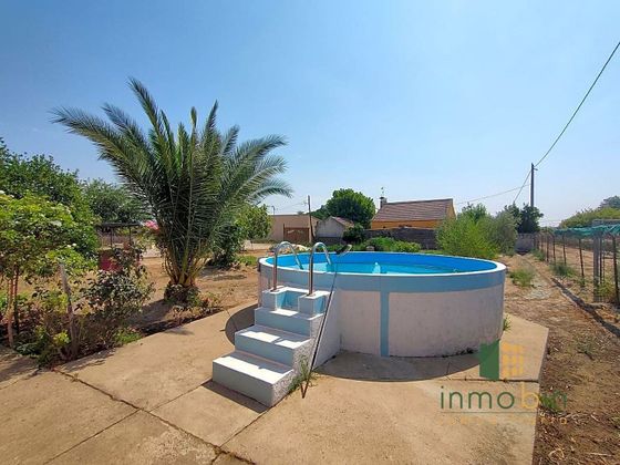 Foto 2 de Casa en venta en Don Benito de 3 habitaciones con piscina y jardín