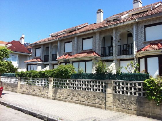 Foto 1 de Casa adossada en venda a El Puntal de 4 habitacions amb terrassa i piscina