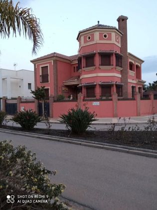 Foto 1 de Chalet en venta en Playa de Granada de 5 habitaciones con terraza y piscina