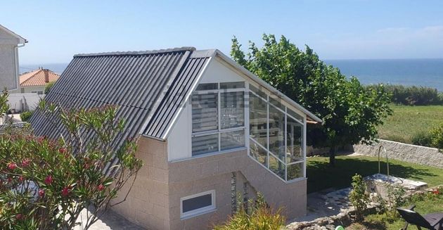 Foto 1 de Venta de chalet en Oia de 2 habitaciones con terraza y piscina
