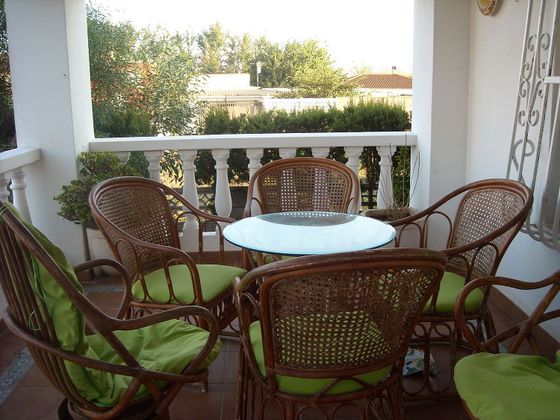 Foto 1 de Venta de casa en El Perelló - Les Palmeres - Mareny de Barraquetes de 6 habitaciones con terraza y piscina