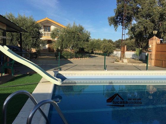 Foto 1 de Casa rural en venda a Carlota (La) de 5 habitacions amb terrassa i piscina