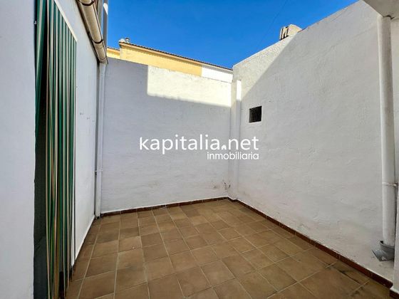 Foto 1 de Casa en venda a Benigánim de 4 habitacions amb terrassa i aire acondicionat
