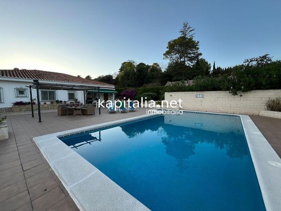 Foto 1 de Chalet en venta en Xàtiva de 4 habitaciones con piscina y garaje