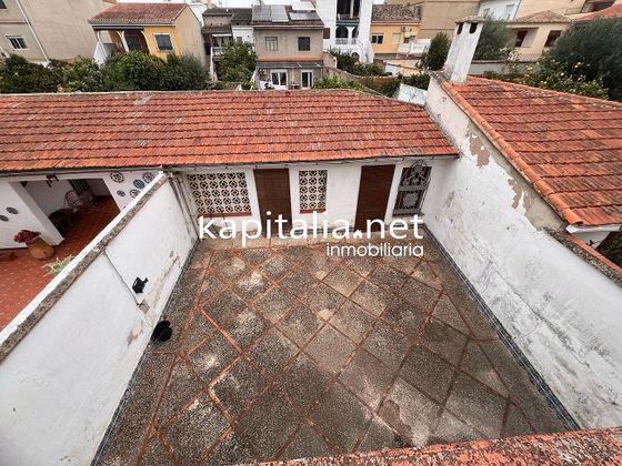 Foto 1 de Casa en venda a Manuel de 4 habitacions amb terrassa i balcó