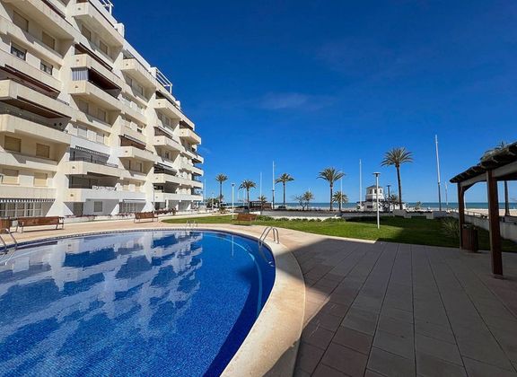 Foto 1 de Dúplex en venta en Playa de Gandia de 4 habitaciones con terraza y piscina