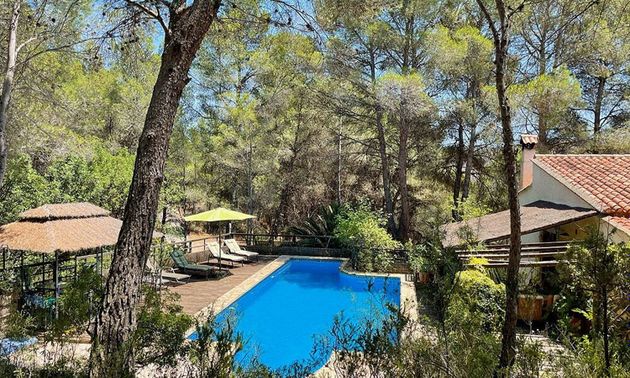 Foto 1 de Casa rural en venta en Chulilla de 4 habitaciones con terraza y piscina