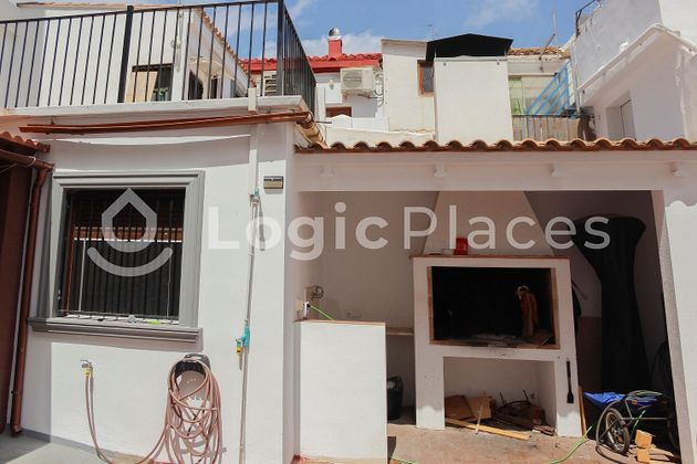 Foto 1 de Casa adosada en venta en calle Valencia de 4 habitaciones con terraza y piscina