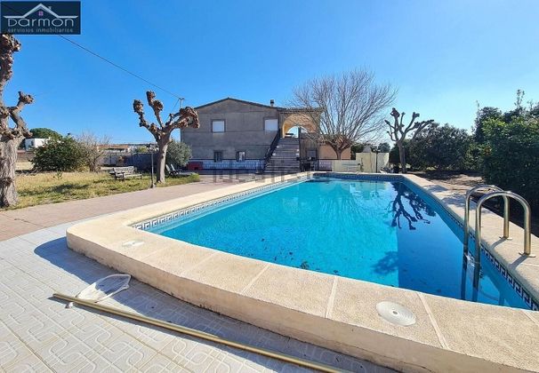 Foto 1 de Casa en venta en Playa de Gandia de 3 habitaciones con terraza y piscina