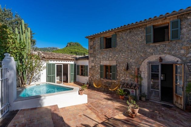 Foto 1 de Casa en venda a Puigpunyent de 3 habitacions amb piscina