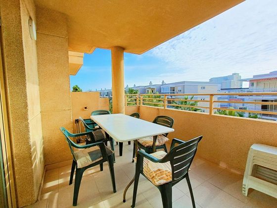 Foto 1 de Venta de piso en El Perellonet de 3 habitaciones con terraza y piscina