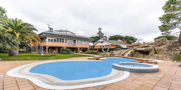 Foto 1 de Venta de casa en El Castillo Campodón de 5 habitaciones con piscina y garaje