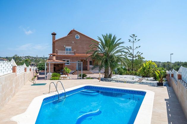 Foto 1 de Chalet en venta en Berà Mar - El Francaset de 5 habitaciones con terraza y piscina