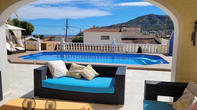 Foto 1 de Chalet en venta en calle Dels Alguers de 4 habitaciones con terraza y piscina