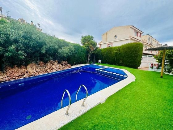 Foto 1 de Venta de casa en Albufereta de 5 habitaciones con terraza y piscina