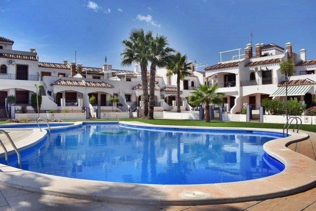 Foto 1 de Venta de dúplex en Villamartín de 2 habitaciones con terraza y piscina