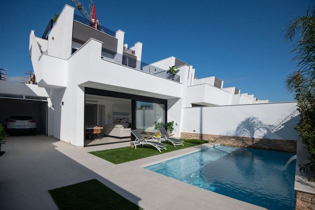 Foto 1 de Casa adossada en venda a Santiago de la Ribera de 3 habitacions amb terrassa i piscina