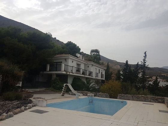 Foto 1 de Venta de casa en Castell de Ferro de 4 habitaciones con piscina y balcón