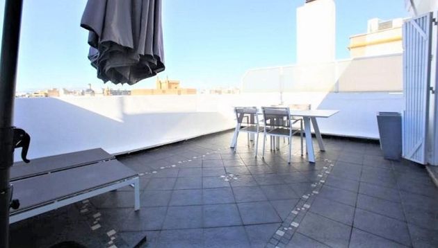 Foto 2 de Alquiler de ático en El Pilar de 1 habitación con terraza y calefacción