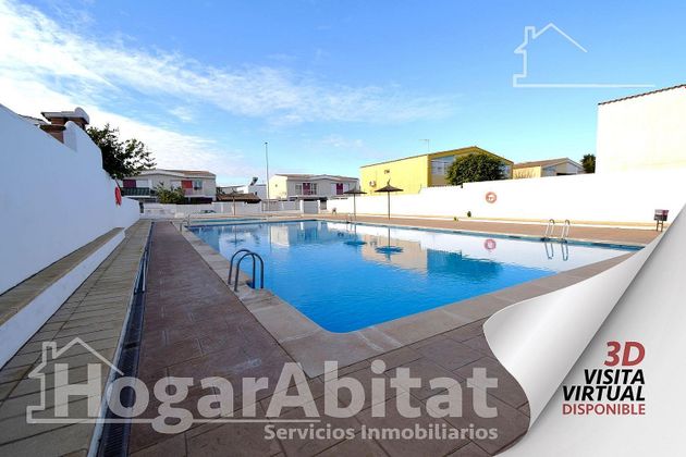 Foto 1 de Casa adossada en venda a Rascanya de 4 habitacions amb terrassa i piscina