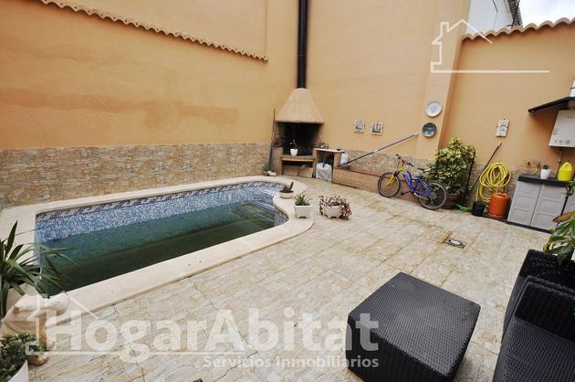 Foto 2 de Venta de casa en Moncada de 4 habitaciones con terraza y piscina