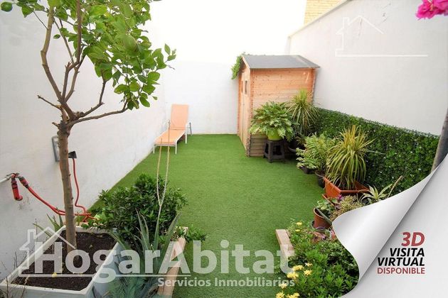 Foto 1 de Venta de casa en Catarroja de 4 habitaciones con terraza y jardín