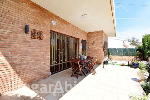 Foto 1 de Xalet en venda a Oliva Playa de 3 habitacions amb terrassa i aire acondicionat