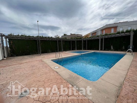 Foto 1 de Casa en venta en Beniarjó de 4 habitaciones con terraza y piscina