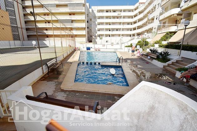 Foto 1 de Venta de piso en El Perellonet de 2 habitaciones con terraza y piscina