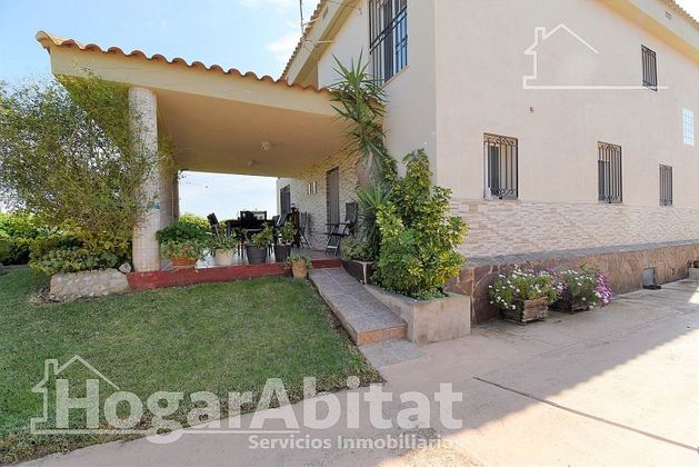 Foto 1 de Chalet en venta en El Grao de 4 habitaciones con terraza y garaje