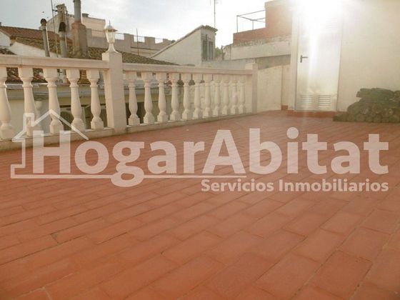 Foto 1 de Casa en venta en Xeraco de 4 habitaciones con terraza y balcón