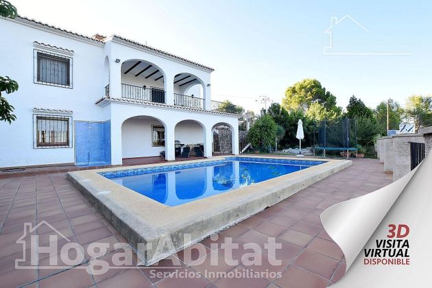 Foto 1 de Venta de chalet en Font d´En Carròs (la) de 8 habitaciones con terraza y piscina