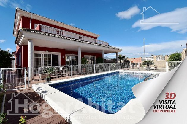 Foto 2 de Chalet en venta en Daimús de 4 habitaciones con terraza y piscina