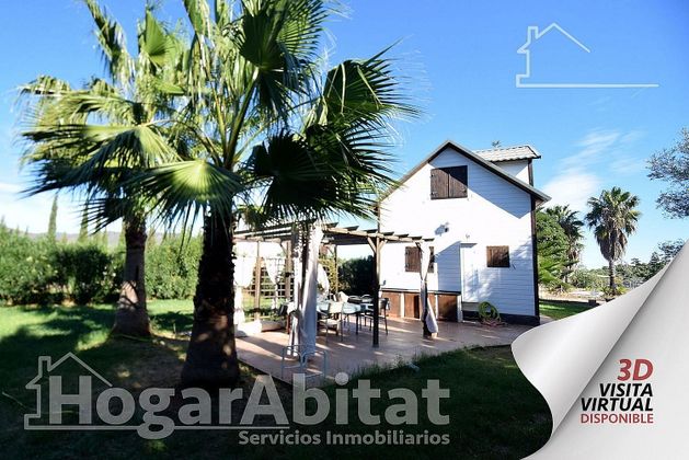 Foto 1 de Chalet en venta en Vall d´Uixó (la) de 9 habitaciones con terraza y piscina