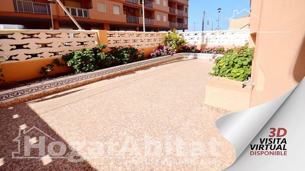 Foto 2 de Venta de piso en El Perelló - Les Palmeres - Mareny de Barraquetes de 2 habitaciones con terraza y piscina