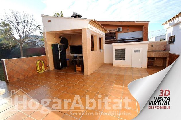 Foto 1 de Casa adosada en venta en Rascanya de 4 habitaciones con terraza y piscina