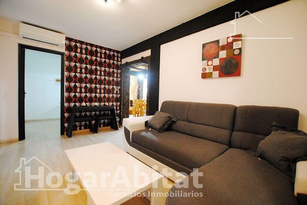 Foto 1 de Piso en venta en Oliva Playa de 3 habitaciones con garaje y aire acondicionado