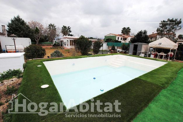 Foto 1 de Chalet en venta en Palma de Gandía de 4 habitaciones con terraza y piscina