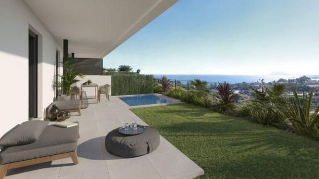 Foto 2 de Casa adosada en venta en Chullera de 2 habitaciones con terraza y piscina