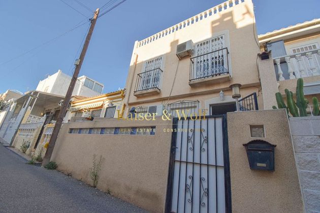 Foto 1 de Casa adossada en venda a San Fulgencio de 2 habitacions amb terrassa i aire acondicionat