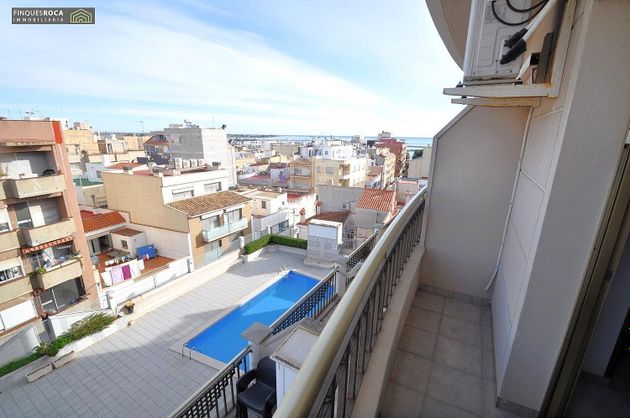 Foto 1 de Piso en venta en Centre - Sant Carles de la Ràpita de 2 habitaciones con terraza y piscina