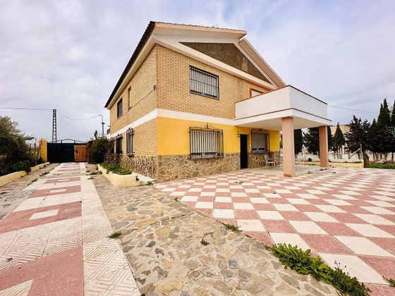 Foto 2 de Venta de chalet en Zubia (La) de 7 habitaciones con terraza y piscina
