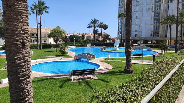 Foto 1 de Venta de casa en Playa del Puig de 4 habitaciones con terraza y piscina