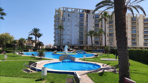 Foto 2 de Venta de casa en Playa del Puig de 4 habitaciones con terraza y piscina
