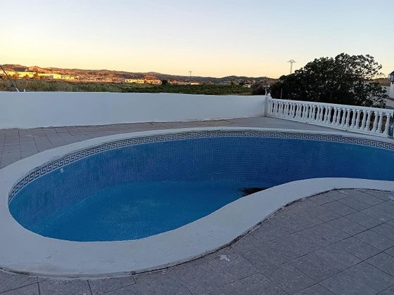 Foto 1 de Chalet en venta en Montroy de 4 habitaciones con terraza y piscina