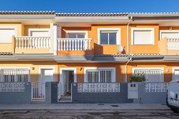 Foto 1 de Casa en venda a Polinyà de Xúquer de 4 habitacions amb terrassa i balcó