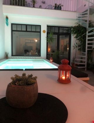 Foto 1 de Casa adossada en venda a L'Eixample de 4 habitacions amb terrassa i piscina