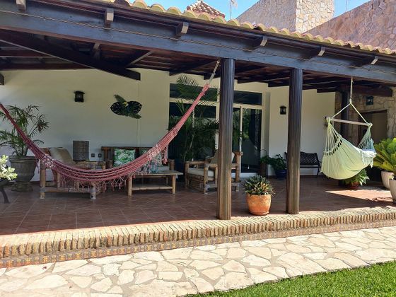Foto 1 de Chalet en venta en calle Sicomoro de 4 habitaciones con terraza y piscina